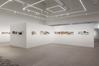 Installation photo of color and black and white ph...