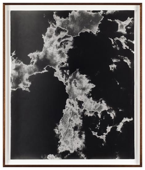 Lisa Oppenheim Man holding large camera photograph...